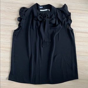 Sleeveless Blouse with Ruffles and Necktie